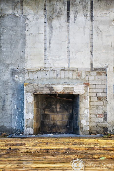 Fireplace in partially demolished home